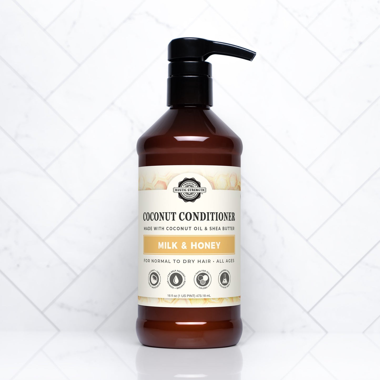 Rustic Strength Coconut Conditioner with Milk & Honey in a 16 oz bottle, featuring a creamy, nourishing formula for healthy hair.
