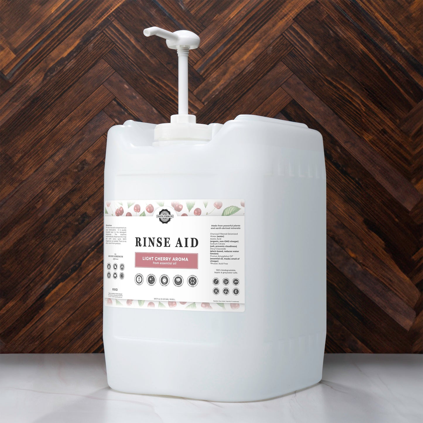Rustic Strength light cherry rinse aid for automatic dishwashers in a 16 oz bottle with flip-top spout.