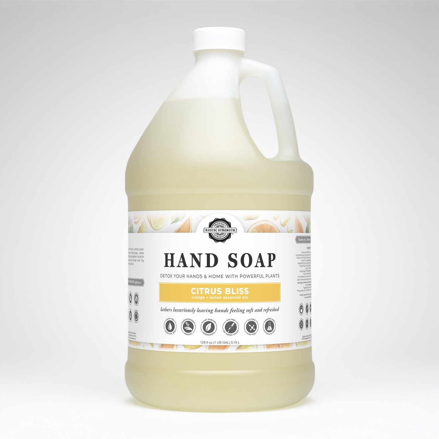 A large, clear plastic jug of Rustic Strength Hand Soap | Citrus Bliss with a white cap and handle. The label highlights its biodegradable formula. The jug is set against a plain white background.