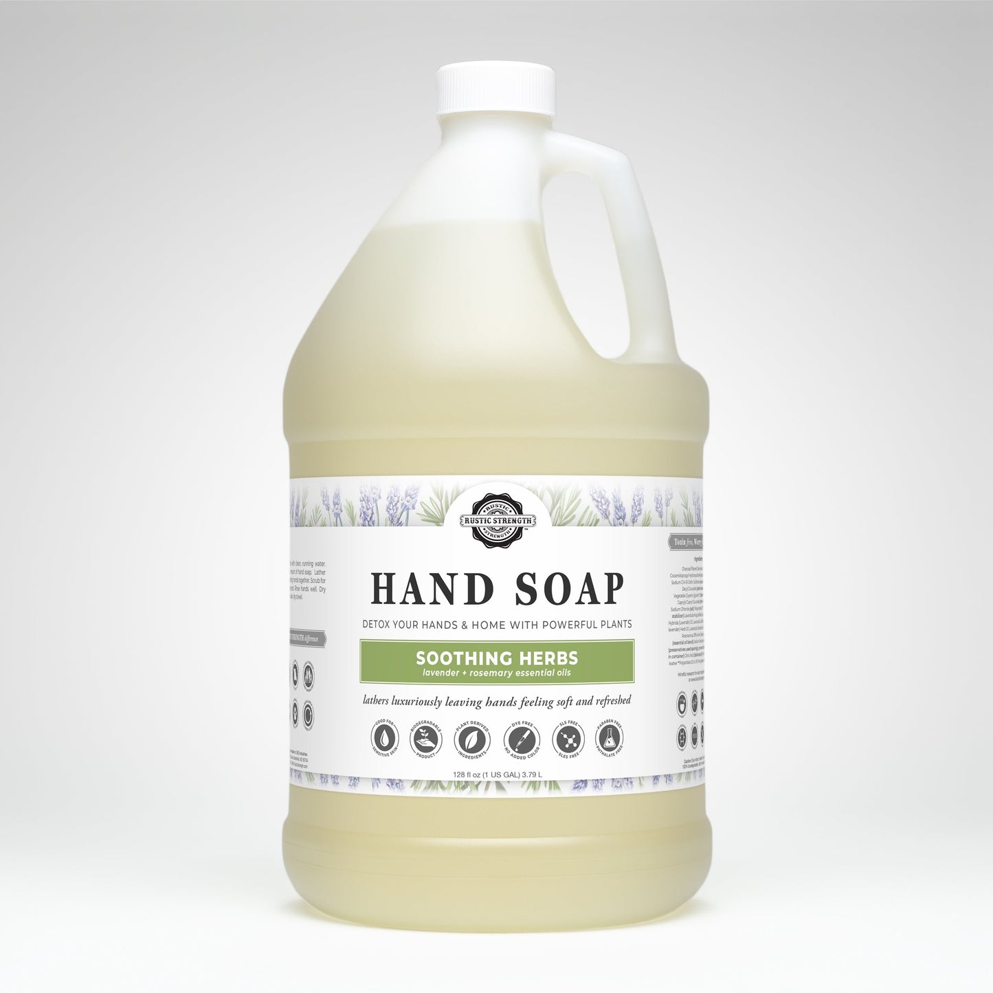 A large plastic jug of Rustic Strength Hand Soap | Soothing Herbs has images of lavender and herbs, a white cap and handle, and a label highlighting moisturizing, softening, and biodegradable features.