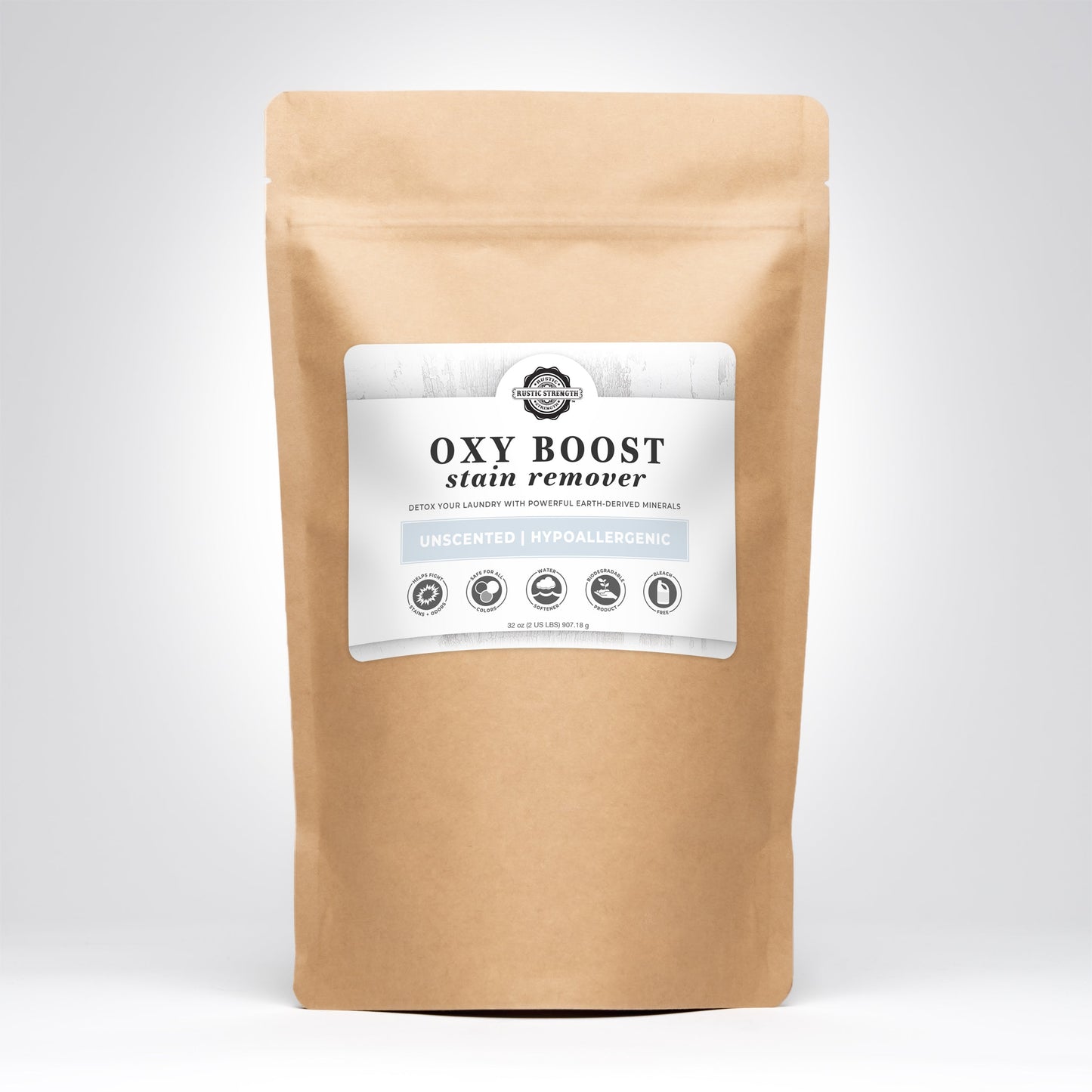 A brown resealable bag of Rustic Strength Oxy Boost Stain Remover stands upright against a plain light background, labeled as toxin free, unscented, hypoallergenic, and made with powerful earth-derived minerals.