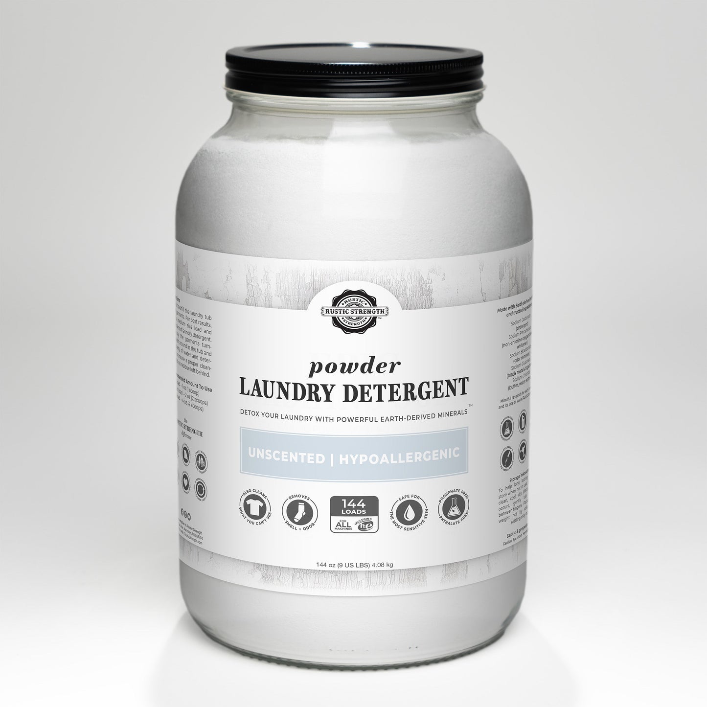 A large glass jar of Rustic Strength Powder Laundry Detergent features a white label with product details and icons for earth-derived minerals. This unscented, hypoallergenic powder is gentle on sensitive skin.