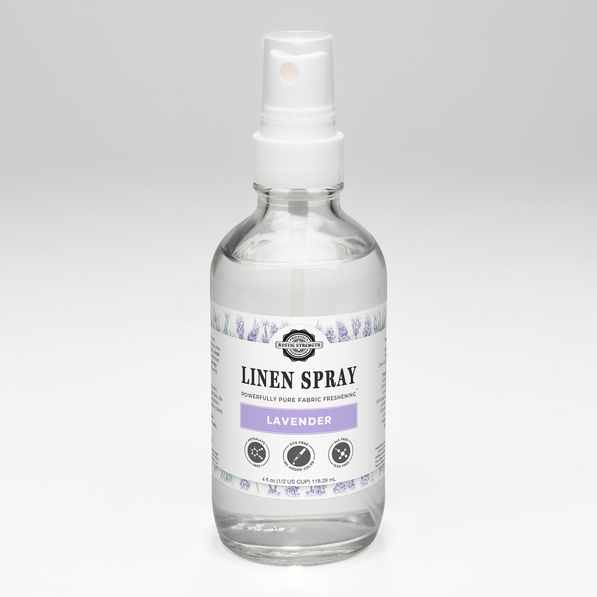 Rustic Strength Lavender Linen Spray bottle with a clear spray nozzle, featuring a rustic label and lavender scent.