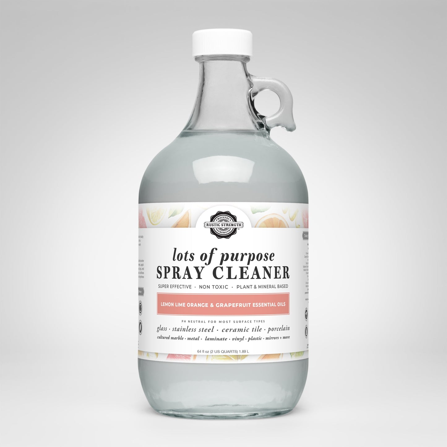Rustic Strength 16 oz multi-purpose spray cleaner with lemon, lime, orange, and grapefruit scents in a clear spray bottle.