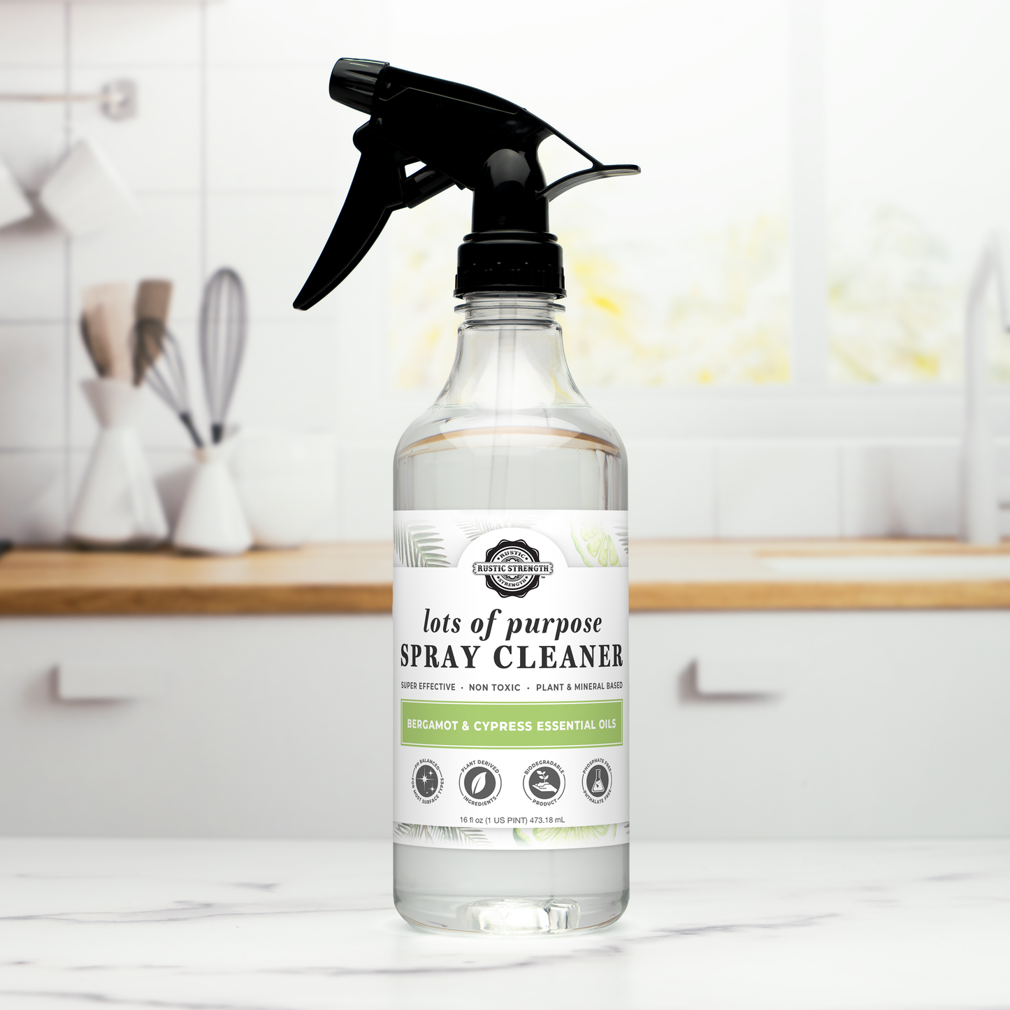 Rustic Strength multi-purpose spray cleaner with bergamot and cypress scent in a 16 oz bottle, ideal for cleaning various surfaces.