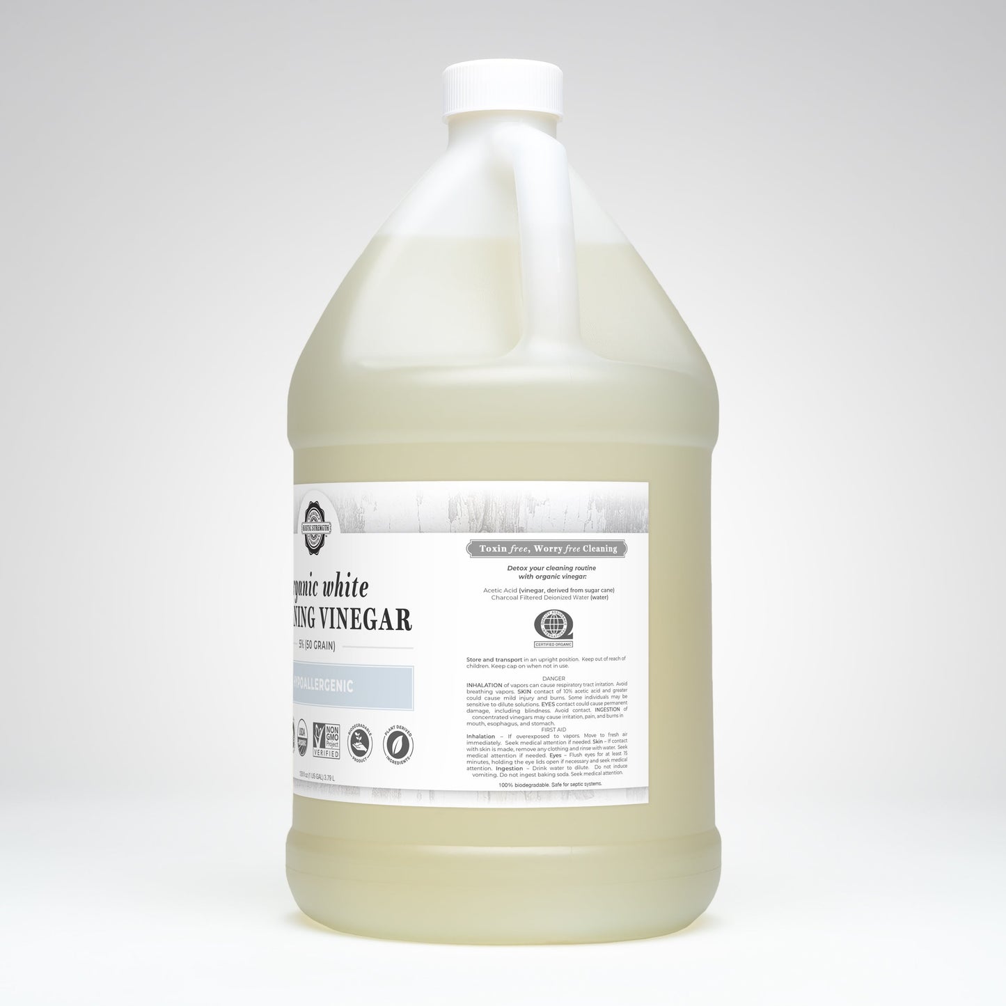 A large, clear plastic gallon jug of Rustic Strength Organic White Cleaning Vinegar | 5% (50 grain) with a white cap and label sits on a plain light background. The label details its uses and notes its biodegradable, Non-GMO formula.