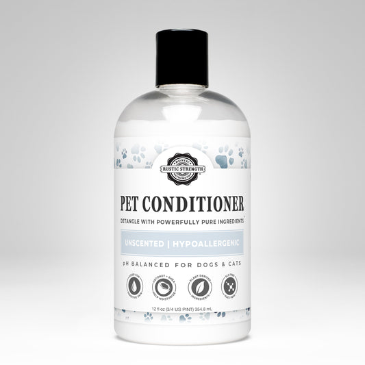 A bottle of Rustic Strength Pet Conditioner | Detangling & Softening | Unscented, with a black cap and blue paw prints. Hypoallergenic and pH balanced for dogs and cats, it uses coconut oil and pure ingredients to detangle fur.