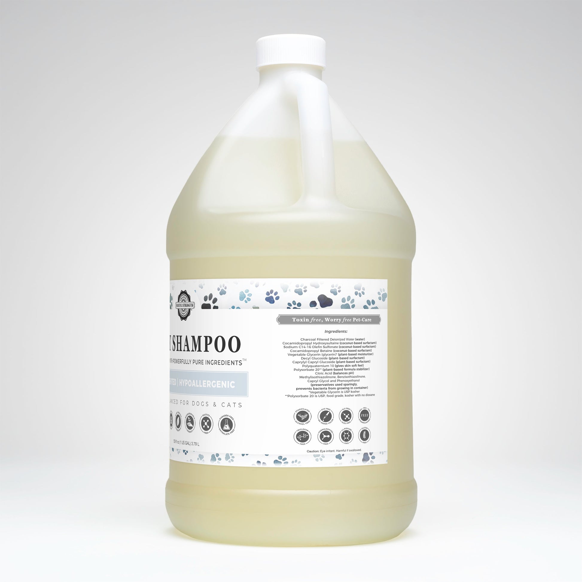 Rustic Strength’s Pet Shampoo | Soothing & Deodorizing | Unscented comes in a large gallon jug with a white cap, light yellow liquid, plant-based ingredients, and a blue-accented label with paw prints. Safe for dogs and cats. Non-toxic formula.