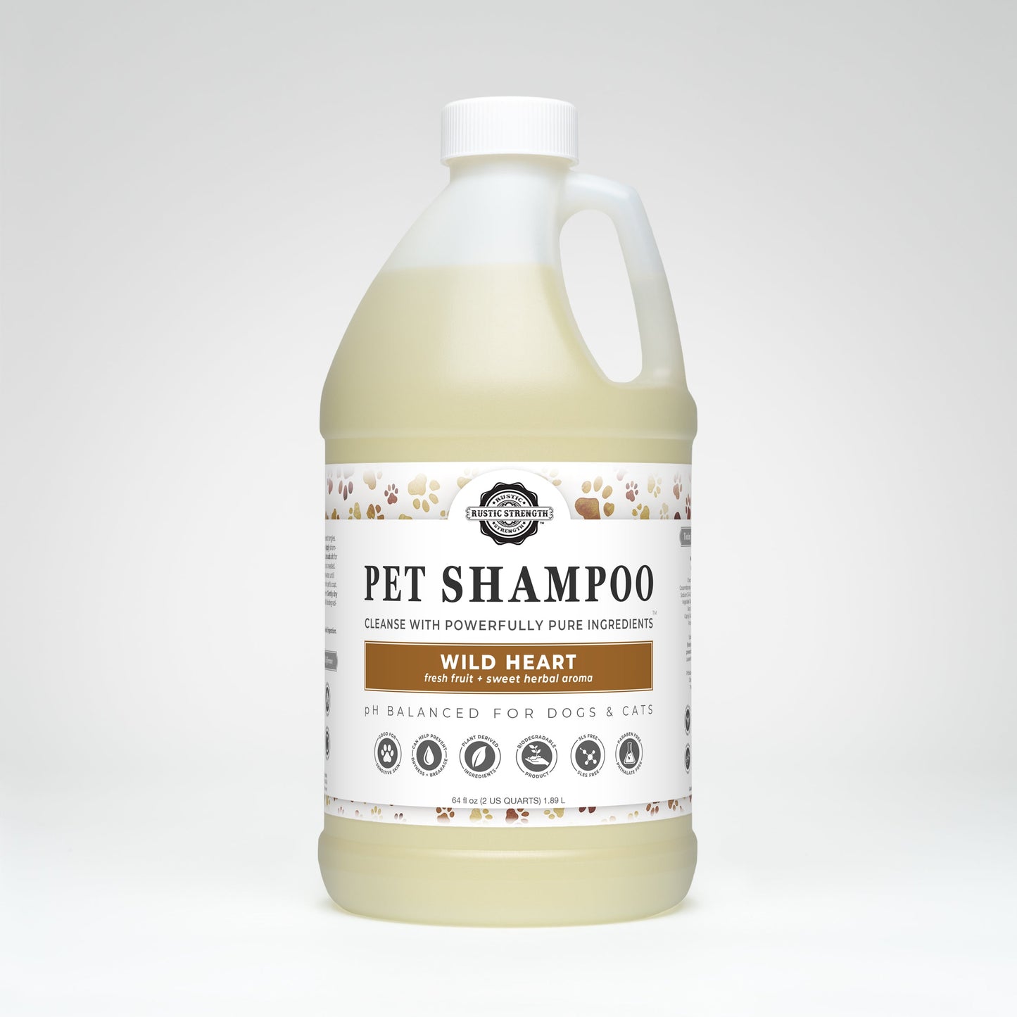 Rustic Strength Pet Shampoo | Soothing & Deodorizing | Wild Heart comes in a large off-white bottle with paw prints, white cap and handle. Made with non-toxic, plant-based ingredients, it’s safe for dogs and cats and shown on a plain white background.