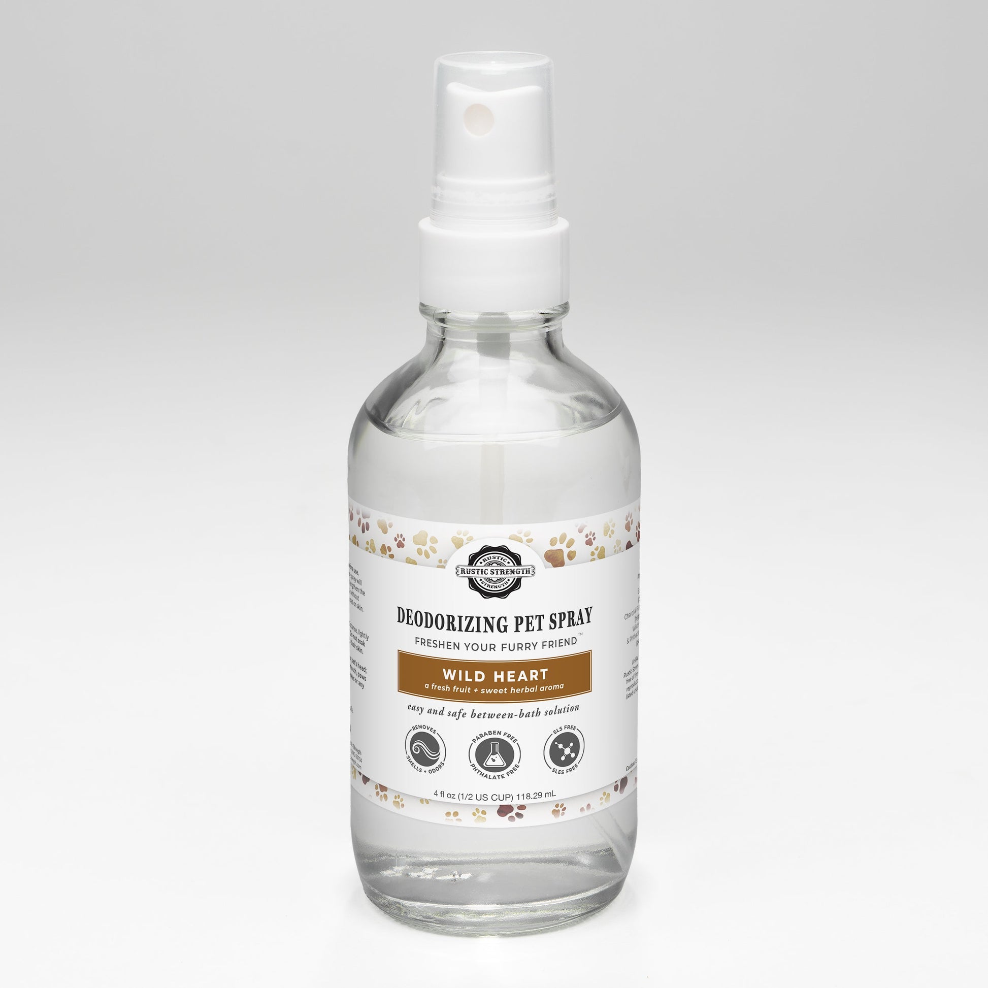 A clear spray bottle labeled Deodorizing Pet Spray | The Between-Wash Wonder by Rustic Strength with paw print designs, this sulfate-free spray features a white pump and is designed to freshen pets. The bottle sits on a plain white background.
