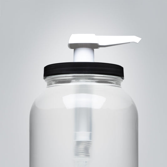 The Rustic Strength 1 Gallon Wide Mouth Jar Measuring Pump features a black screw-on lid and white pump dispenser, displayed against a plain light gray background.