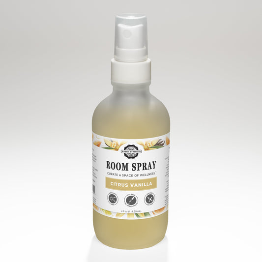 Rustic Strength Citrus Vanilla Room Spray bottle with a clear label, designed for freshening indoor spaces with a citrus vanilla scent.