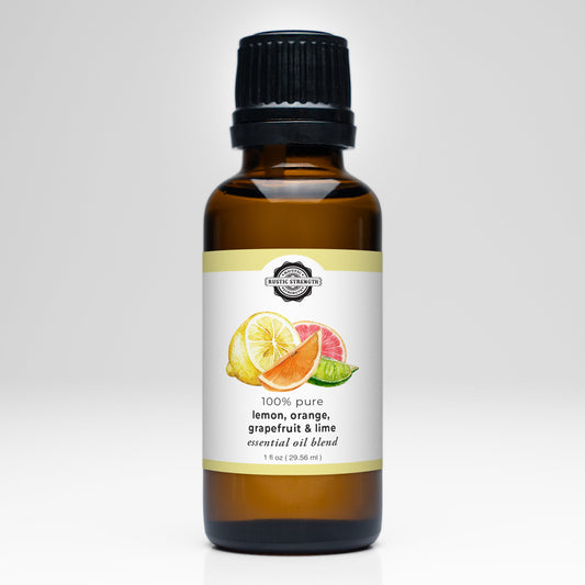 Rustic Strength Lemon, Orange, Grapefruit & Lime Essential Oil Blend comes in a brown glass bottle with a black cap. The label displays citrus slices and notes its 100% pure—ideal for aromatherapy with a refreshing citrus scent.