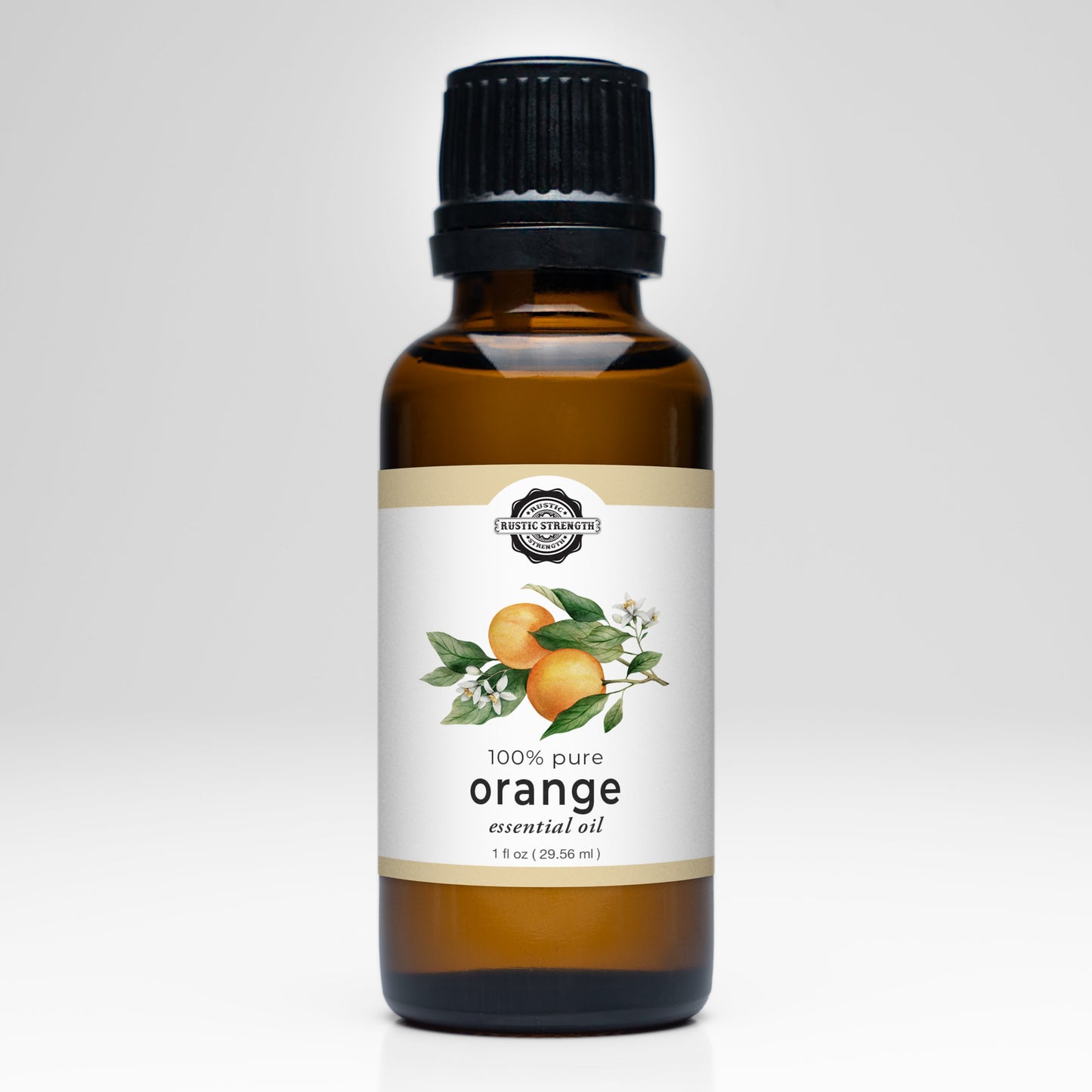 A 1 fl oz (29.55 ml) brown glass bottle of Rustic Strength Orange Essential Oil with a black cap, labeled 100% pure and featuring oranges and leaves—ideal for aromatherapy and essential oil uses.