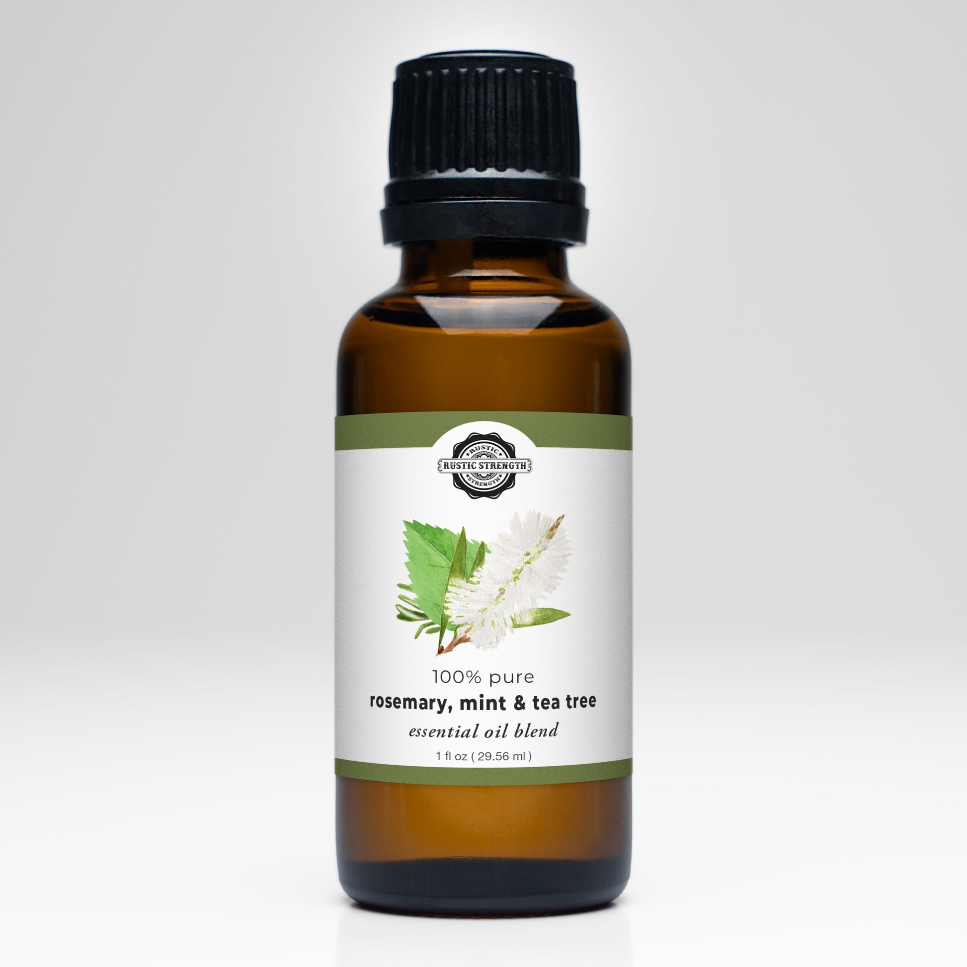 A brown glass bottle with a black cap, labeled Rustic Strength Rosemary, Mint & Tea Tree Essential Oil Blend for aromatherapy, features illustrations of rosemary, mint, and tea tree leaves on a white background.