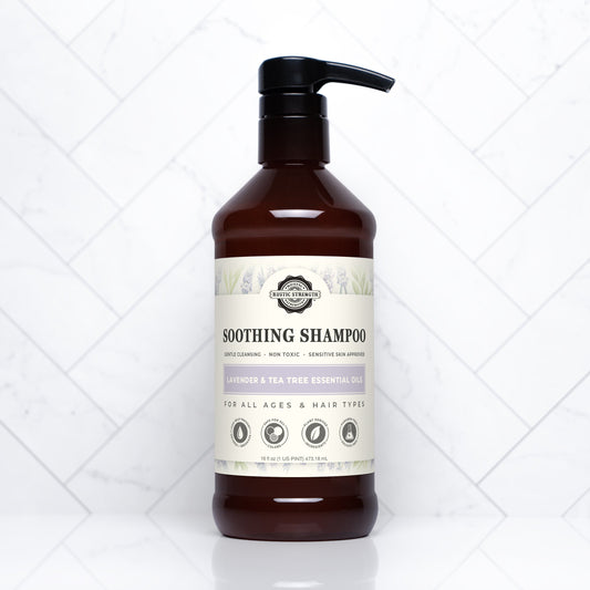 Rustic Strength Soothing Shampoo with lavender and tea tree, 16 oz bottle, showing the shampoo's natural ingredients and clear packaging.