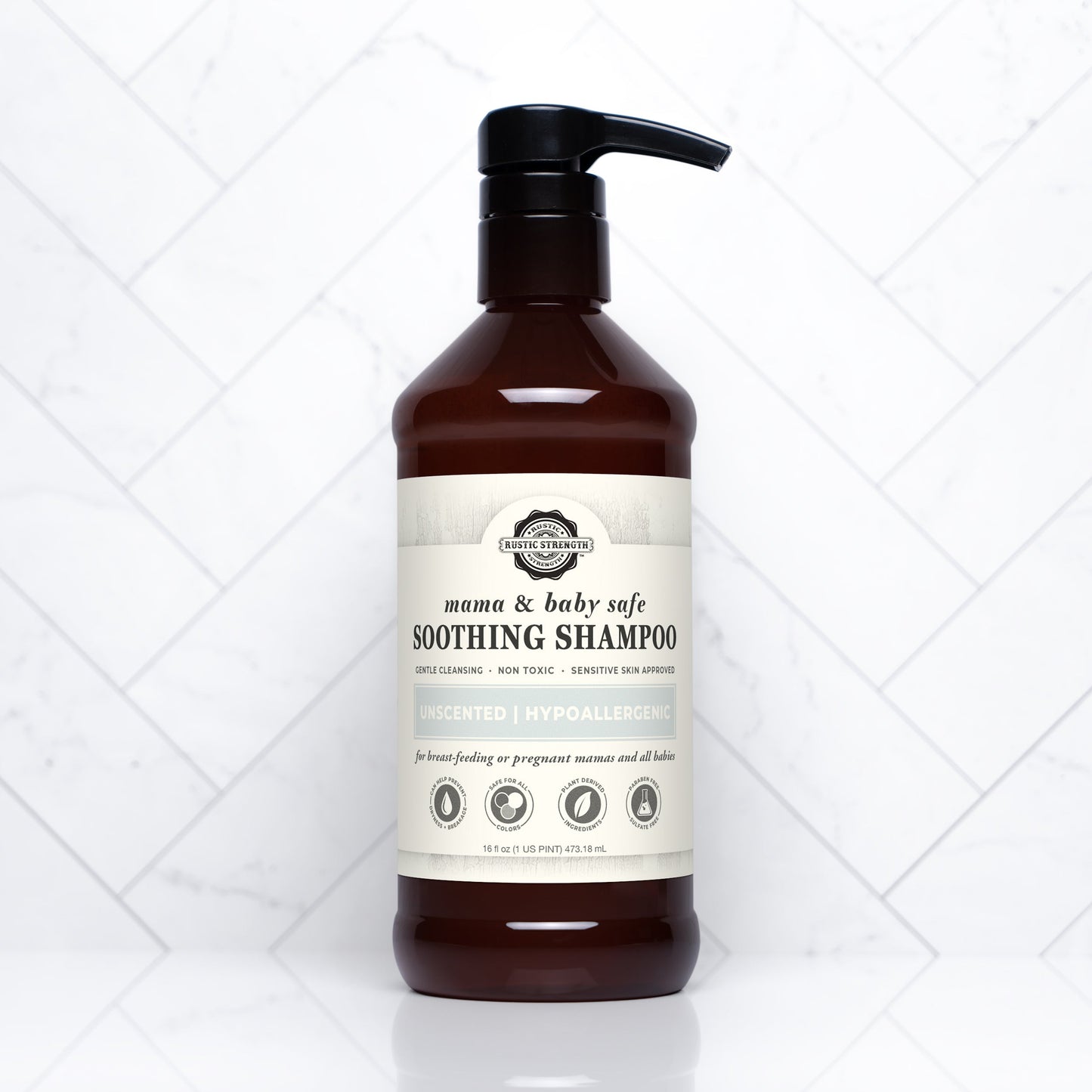 Rustic Strength Soothing Shampoo in 16 oz bottle, gentle and safe for mama and baby, with calming ingredients for sensitive scalps.