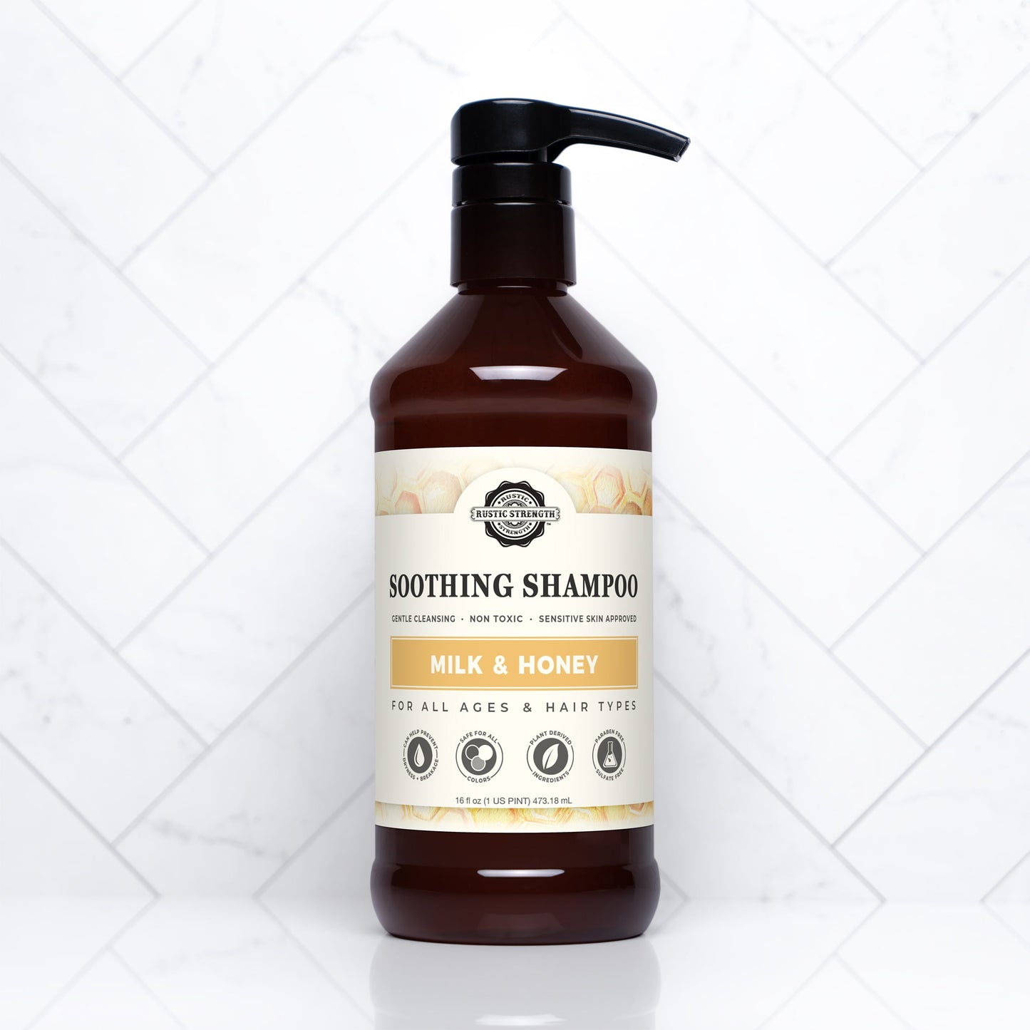 Rustic Strength Soothing Shampoo with Milk & Honey, 16 oz bottle, showing the shampoo's creamy texture and natural ingredients.