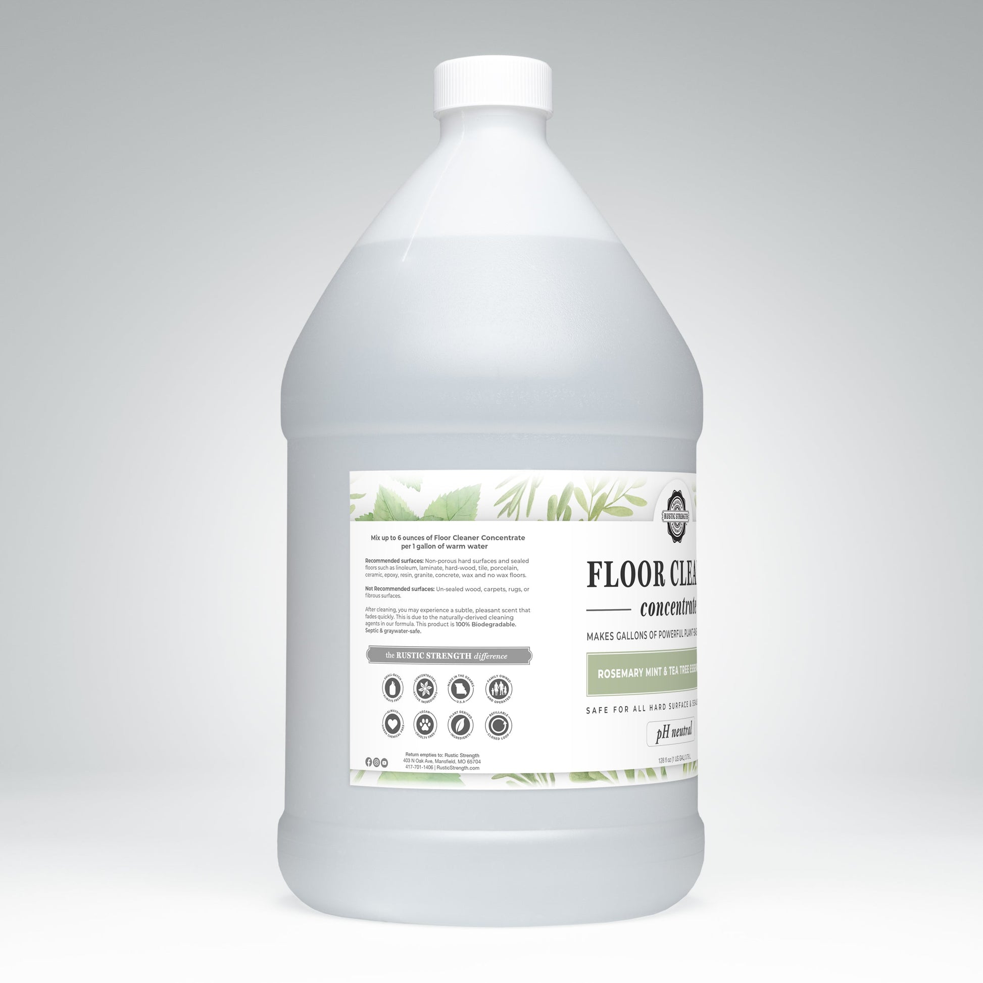 Rustic Strength floor cleaner concentrate in a 16 oz soap bottle with flip-top spout, scented with rosemary, mint, and tea tree.