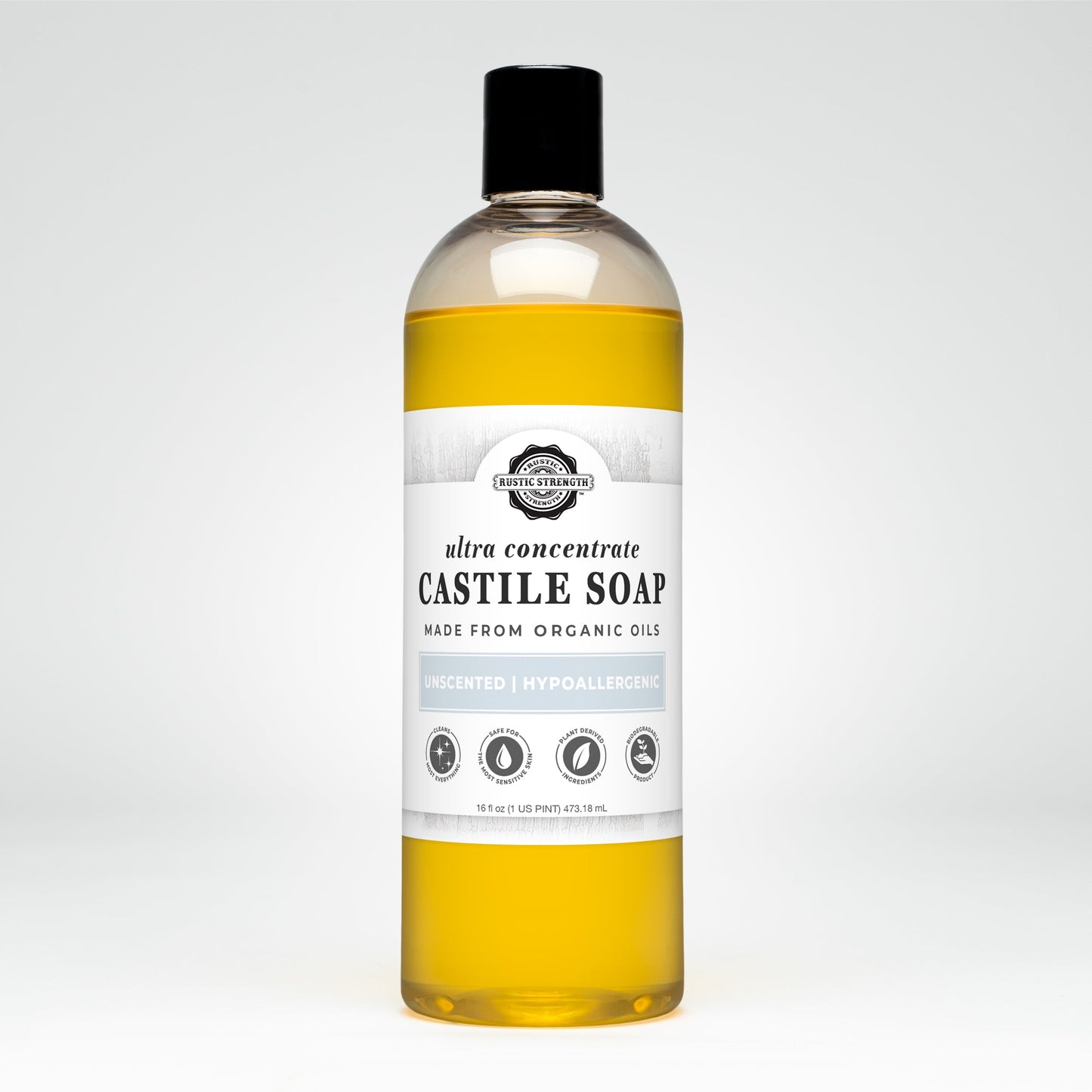 A clear bottle of Rustic Strength Castile Soap - Ultra Concentrate | Unscented, made from organic oils and filled with yellow liquid, sits on a white background; its hypoallergenic and a multi-purpose cleaner.