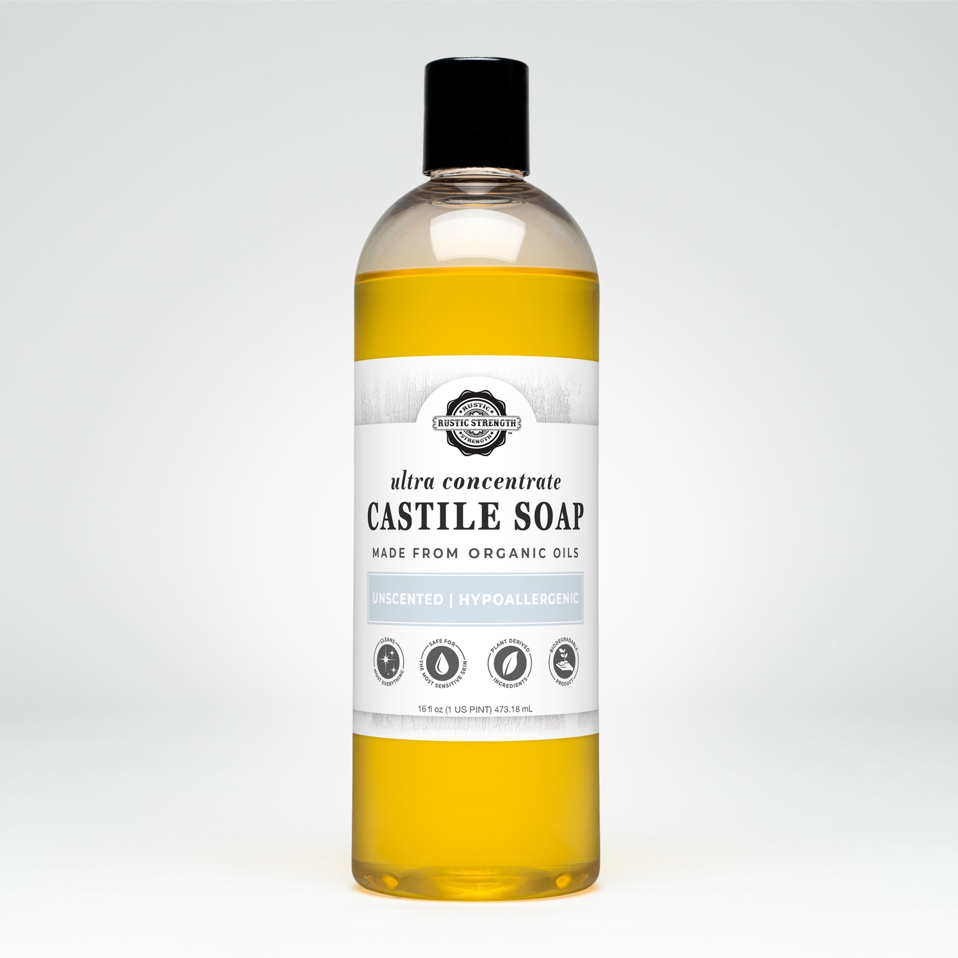 A clear bottle of Rustic Strength Castile Soap - Ultra Concentrate | Unscented, made from organic oils and filled with yellow liquid, sits on a white background; its hypoallergenic and a multi-purpose cleaner.
