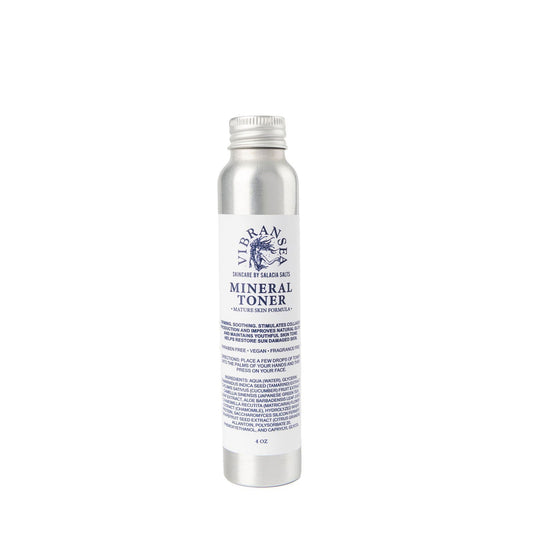 A silver cylindrical bottle labeled Vibransea Mineral Toner - Mature Skin Formula by Salacia Salts stands upright against a white background. Blue text and a seaweed logo highlight this 4 oz marine minerals botanical facial toner for mature skin.