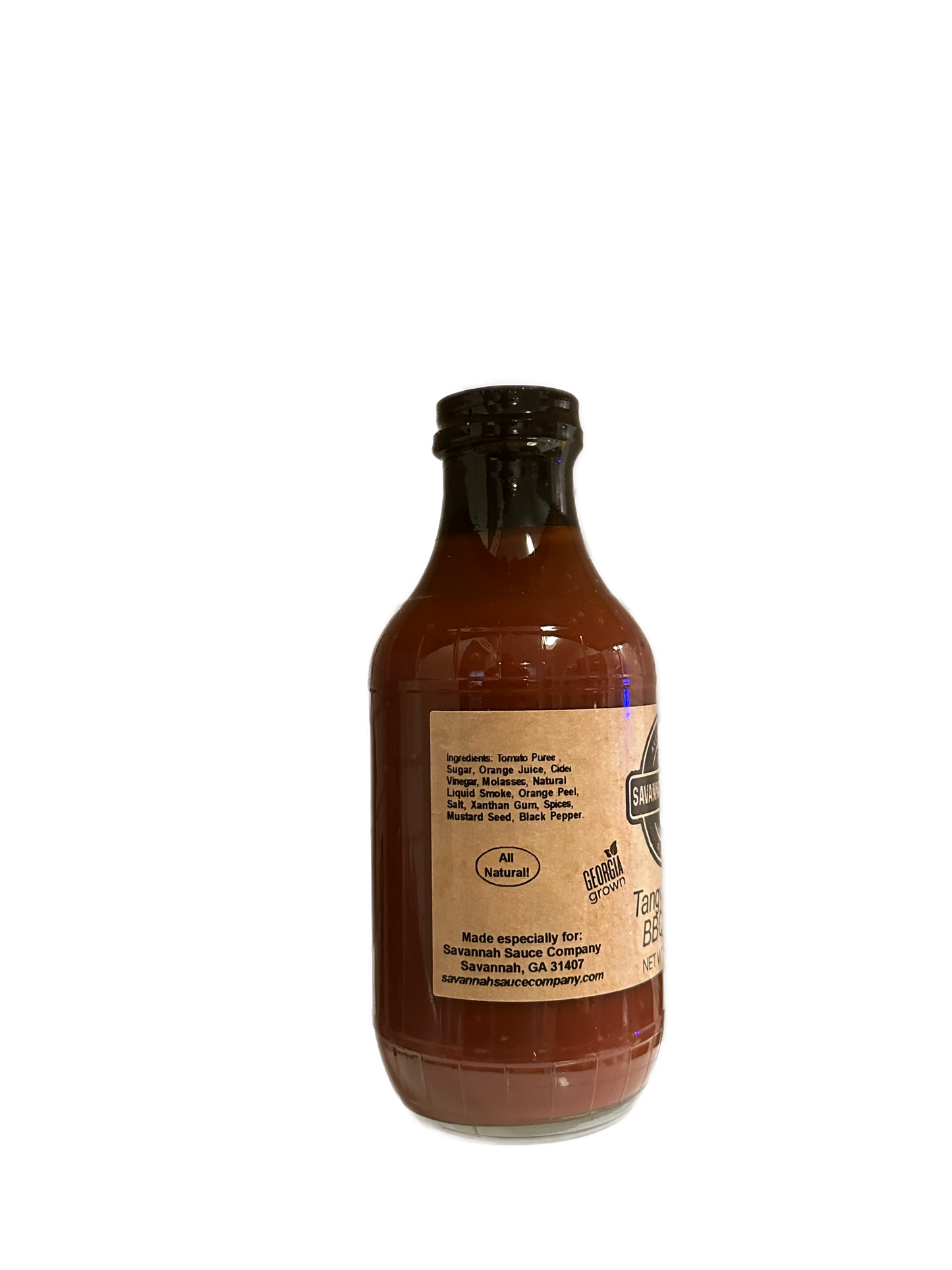 A case of NEW Tangy Orange BBQ Sauce by SavannahSauceCompany, made with Jacksonville Florida oranges, comes in glass bottles with brown paper labels showing ingredients and company info, displayed on a plain white background.