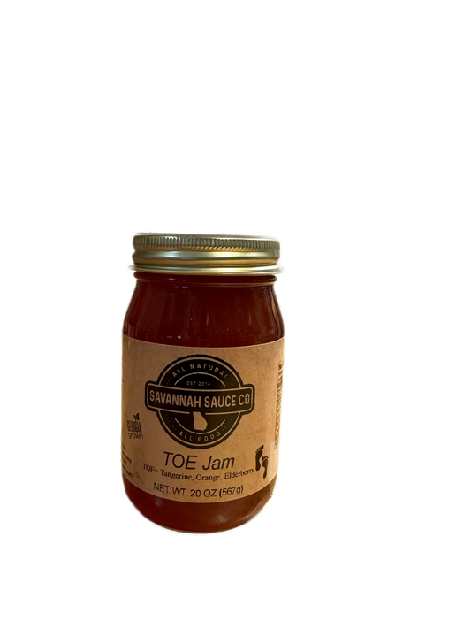 A 20 oz (567g) glass jar of SavannahSauceCompany NEW TOE Jam (Tangerine, Orange, and Elderberry), with a gold lid and brown label highlighting its natural immune-boosting ingredients, set against a white background.
