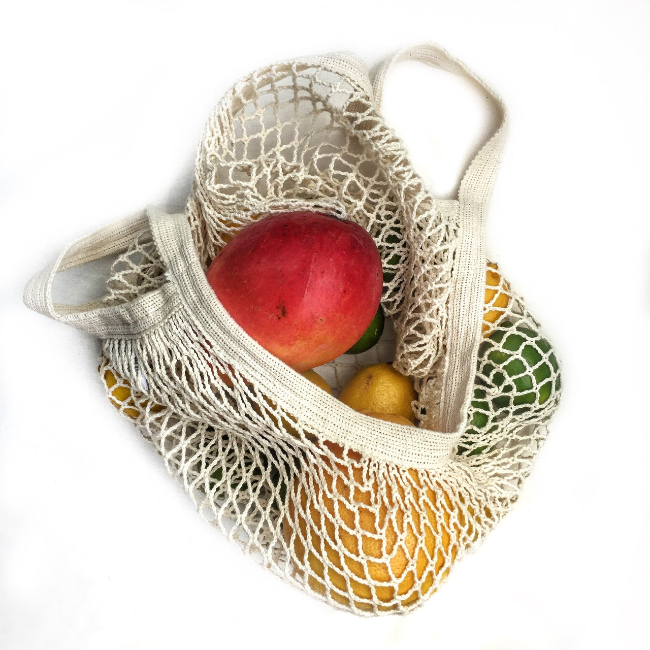 French Market Tote from Seattle Seed Company, cotton string bag with sturdy handles and spacious interior for shopping and carrying.