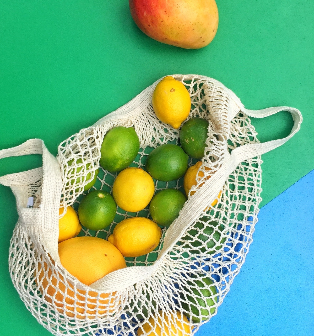 French Market Tote from Seattle Seed Company, cotton string bag with sturdy handles and spacious interior for shopping or casual use.