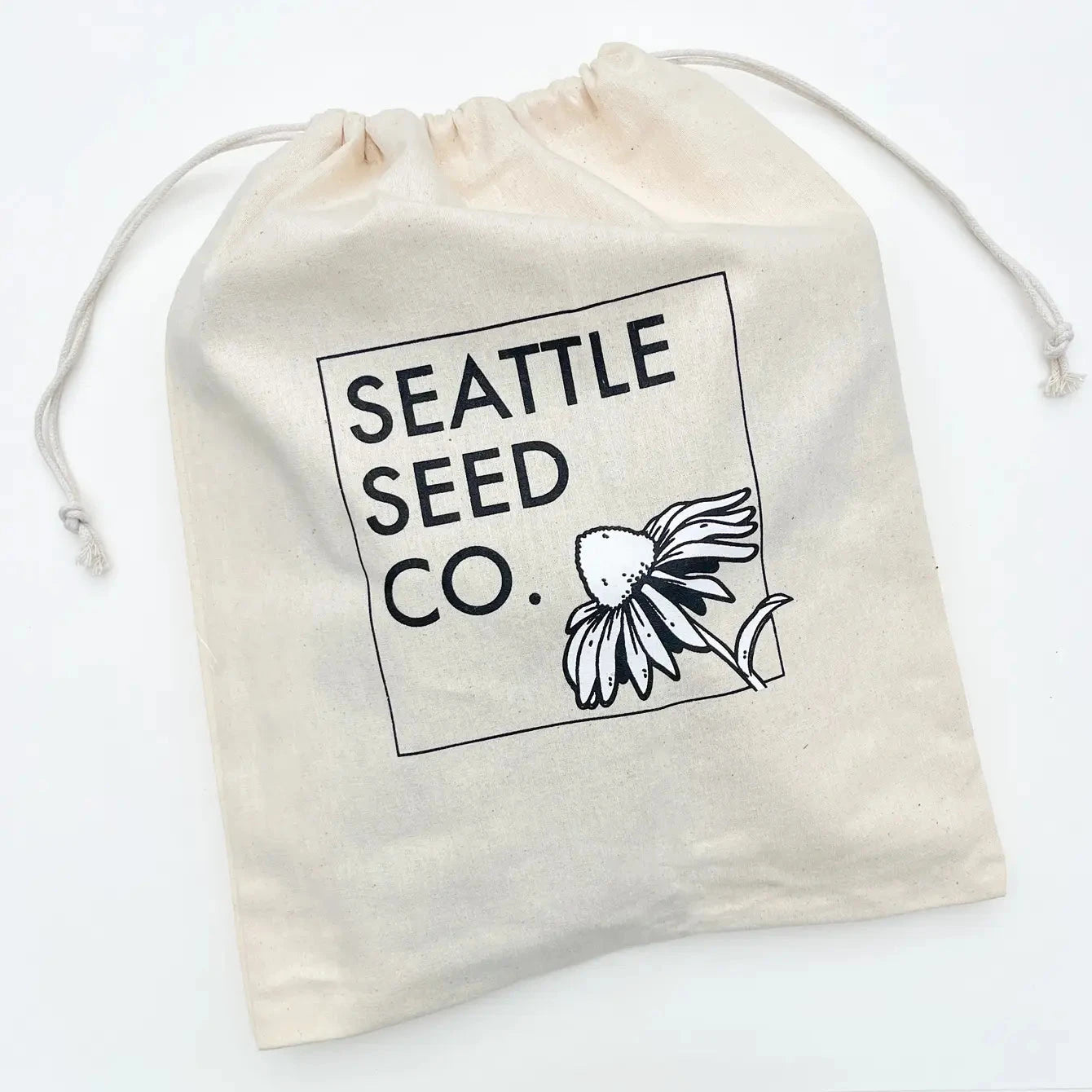 Genuine leather gardener's tool belt by Harvest Essentials from Seattle Seed Company, featuring multiple pouches for gardening tools.