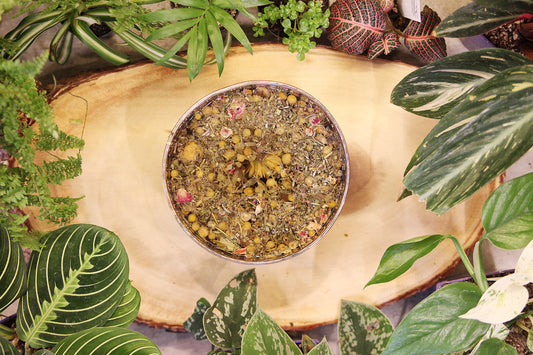 Herbal Steam Facial Blend by Seattle Seed Company with dried herbs in a bowl for skincare treatment.