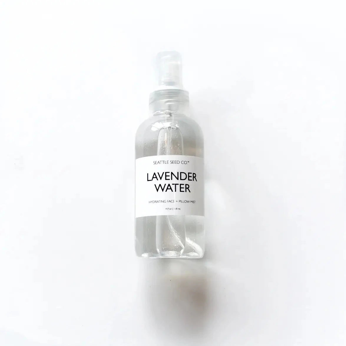 Lavender face and pillow mist by Seattle Seed Company in a spray bottle, featuring calming lavender scent and natural ingredients.