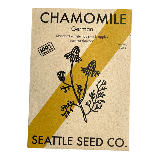 German chamomile herb from Seattle Seed Company, showing fresh dried chamomile flowers and leaves.