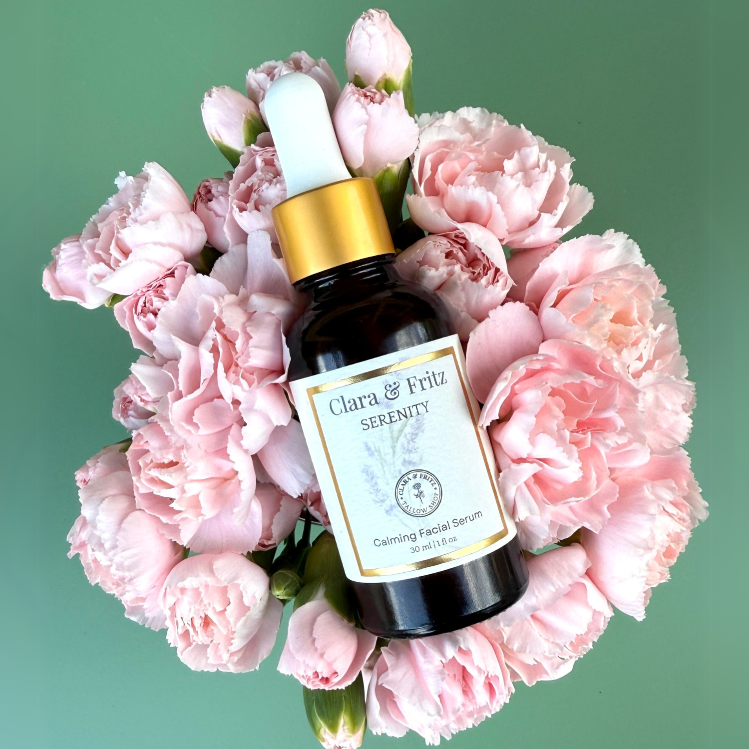 Clara & Fritz Tallow Shop Serenity Calming Facial Serum in a clear glass bottle with a dropper for soothing skin care.