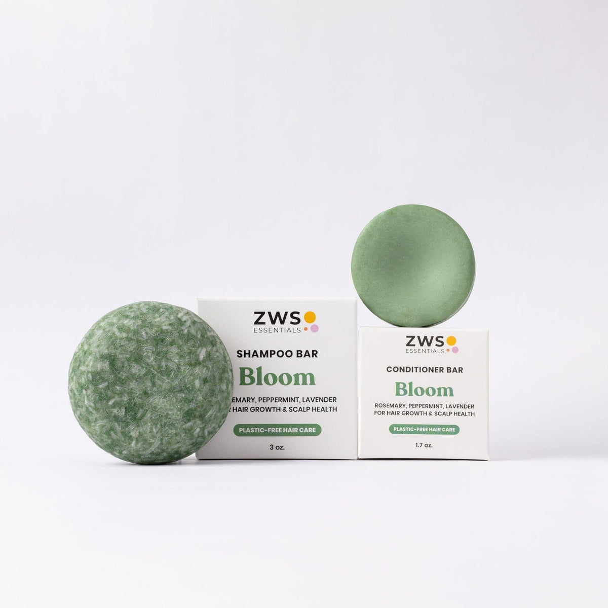 ZeroWasteStore.com shampoo and conditioner bar duo with blooming scent, featuring castor oil in eco-friendly hair care set.