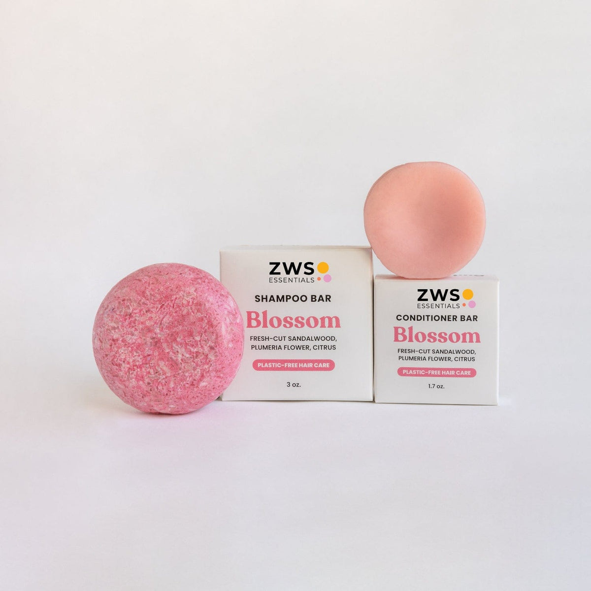 ZeroWasteStore.com shampoo and conditioner bar duo with blossom scent, eco-friendly hair care set, natural hair cleansing and conditioning.