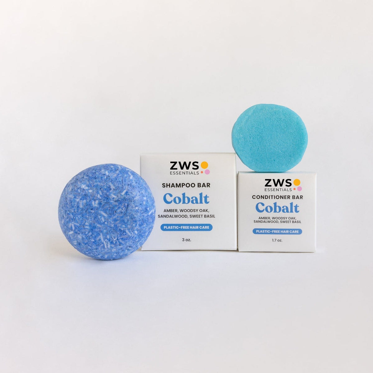 Cobalt-colored shampoo and conditioner bar duo from ZeroWasteStore.com, eco-friendly hair care set in a natural packaging.