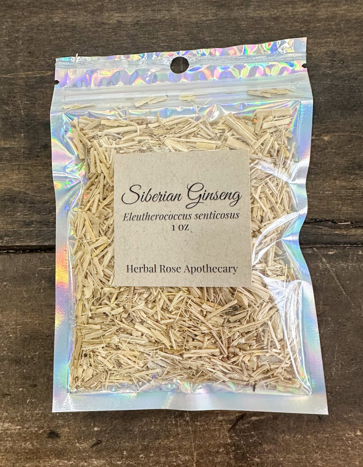 Dried Siberian ginseng herbs in a 1oz package from HerbalRoseApothecary showing dried root slices.