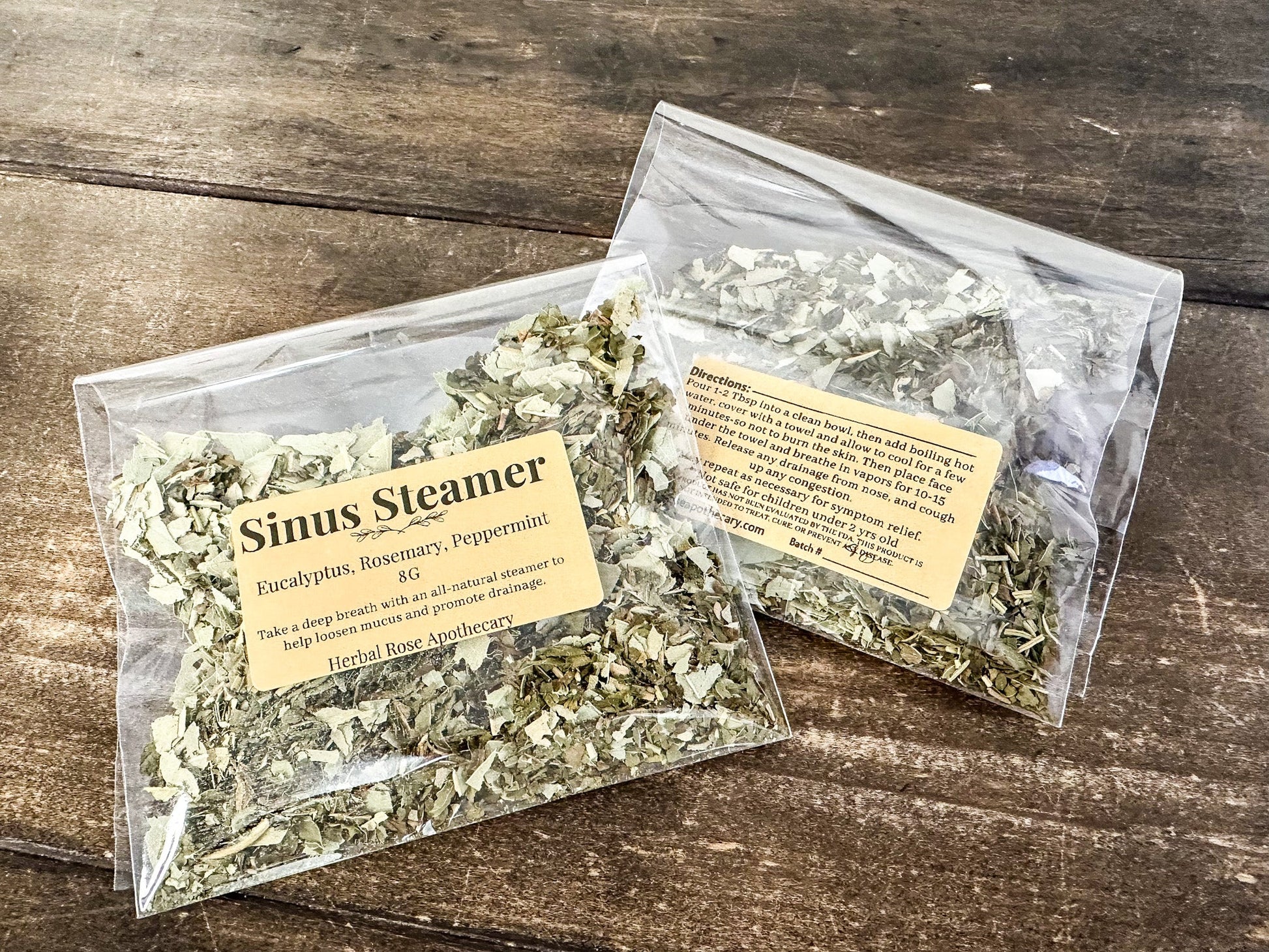 Herbalroseapothecary sinus steamers in a clear bowl with herbal blends and steam rising, used for sinus relief and nasal congestion relief.
