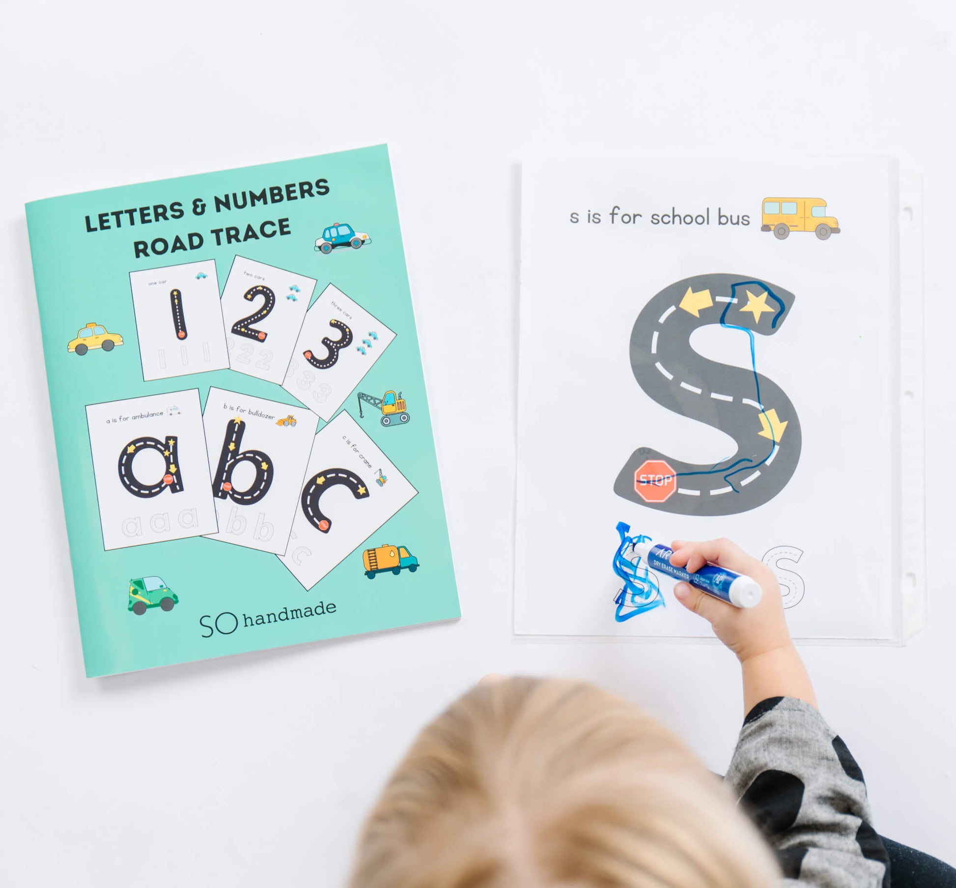 Coloring page from So Handmade Shop's Road Trace Activity Book featuring alphabet and numbers for early learning.