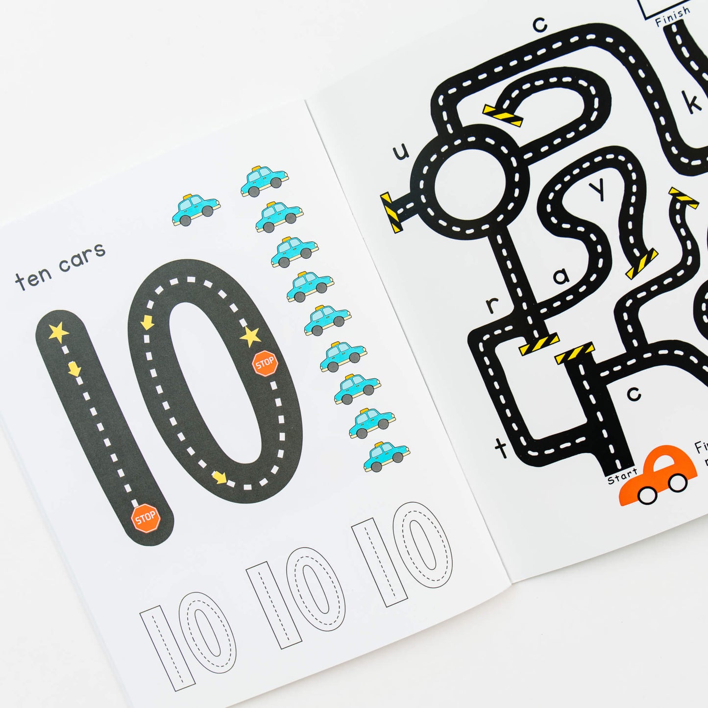 Coloring page from So Handmade Shop Road Trace Activity Book featuring alphabet and numbers learning activities for kids.