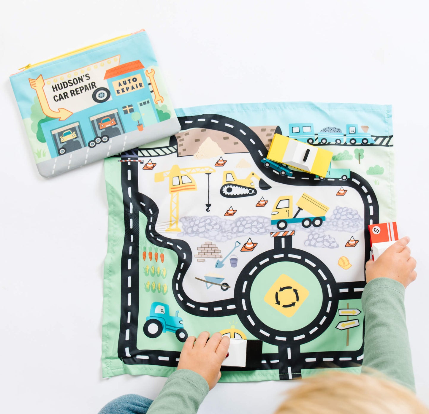 Colorful toy car playmat and pouch from So Handmade Shop, designed for travel entertainment and easy storage.