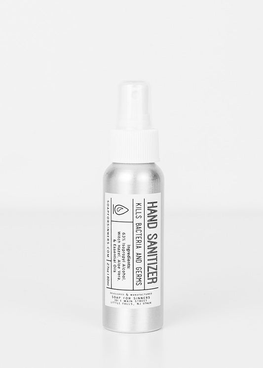 Soap for Sinners oil hand sanitizer in a 2 oz (60ml) bottle, clear liquid sanitizer with a pump dispenser.