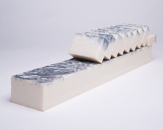 Soap for Sinners pumice microdermabrasion soap bar showing textured surface for exfoliation and skin renewal.