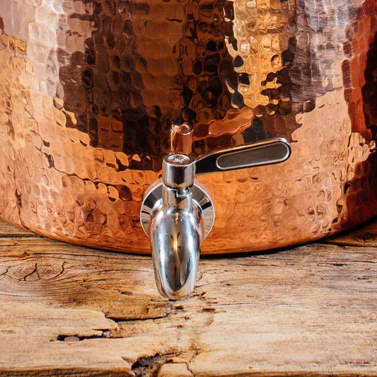 Sertodo water dispenser spigot with brass handle and threaded connection for easy water dispensing.
