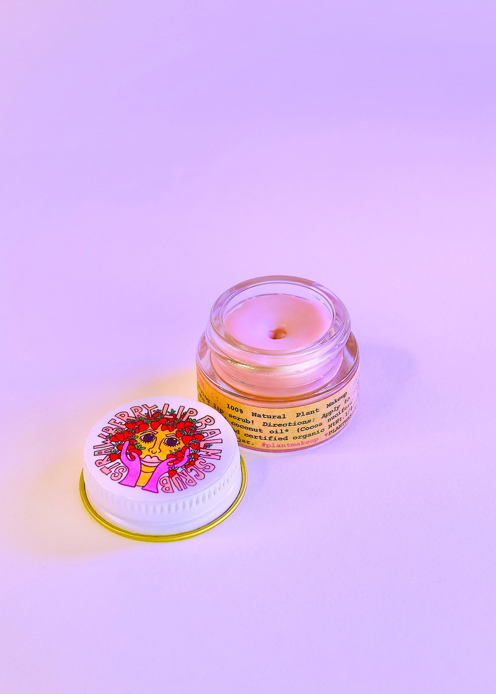 Plant Makeup Strawberry Dreamsicle Lip Balm Scrub with fresh strawberry and creamy texture for smooth, exfoliated lips.