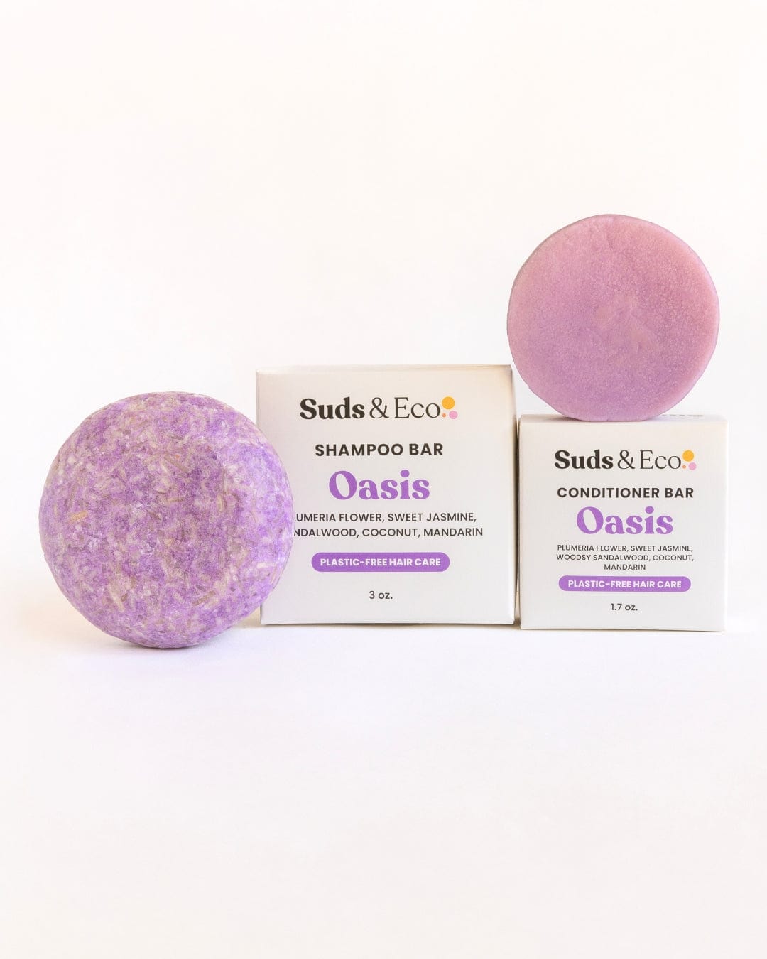 Shown are two Shampoo & Conditioner Bar Duo sets from ZeroWasteStore.com with their boxes, featuring natural ingredients and supporting zero-waste, plastic-free hair care.