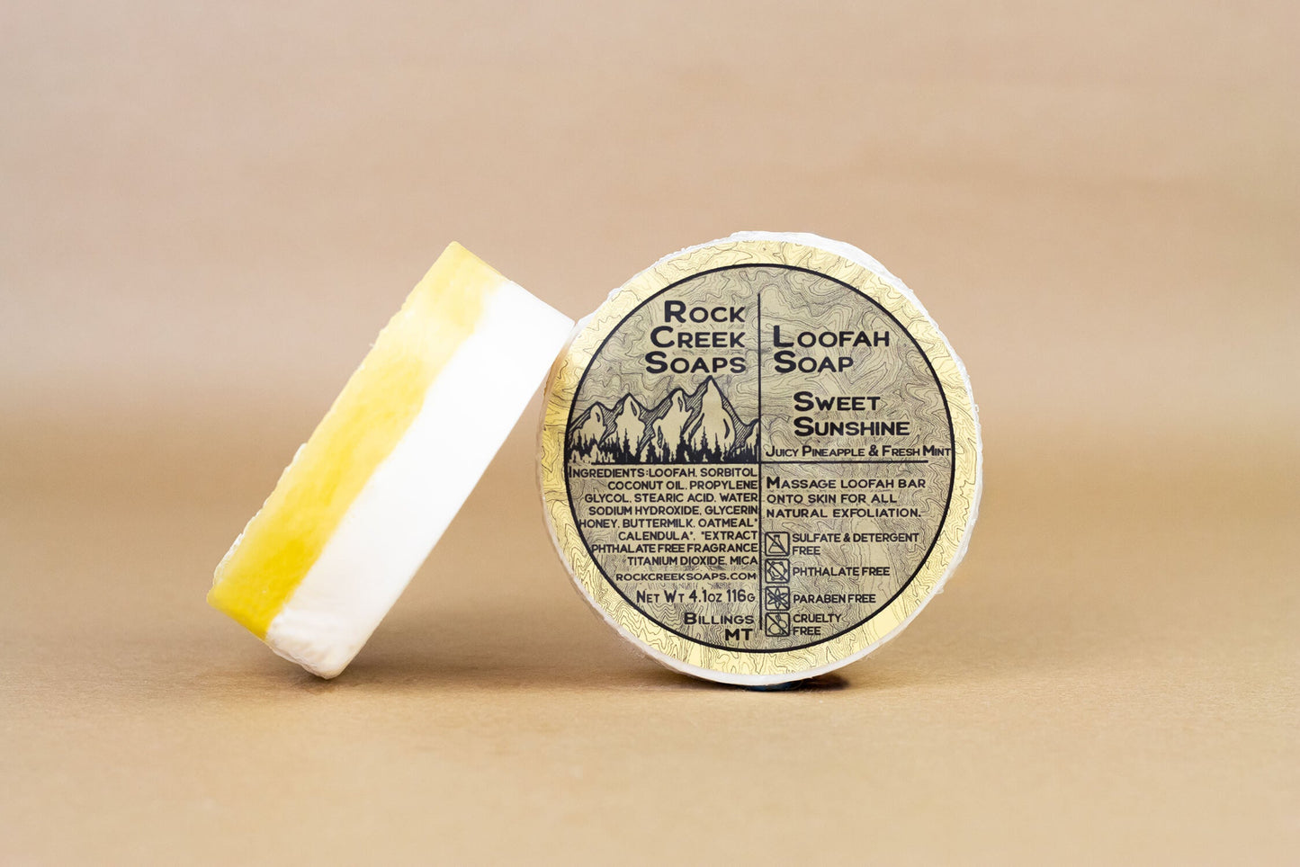Rock Creek Soaps Sweet Sunshine Loofah Soap with natural loofah exfoliant and bright citrus scent, shown tilted in the image.