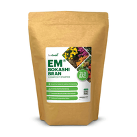A brown resealable bag labeled TeraGanix EM Premium Bokashi Compost Starter, 2lb, features colorful flowers and highlights benefits like enriching soil health, boosting beneficial microbes, and reducing compost odors.